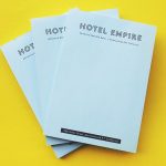 printed notepads for a hotel with blue paper