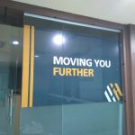 glass pasting of vinyl posters inside office in pune